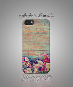 Vintage wood on the background while summer flowers on the forground mobile cover