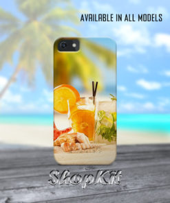 Orange drink glass on beach sand mobile cover