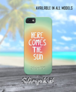 Here comes the sun written on mobile cover