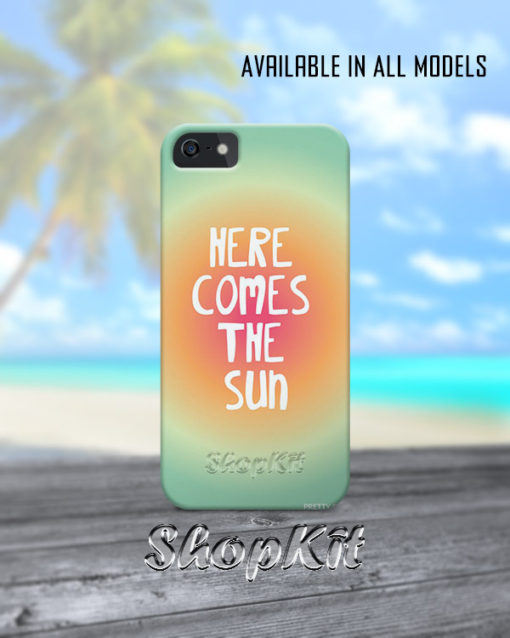 Here comes the sun written on mobile cover